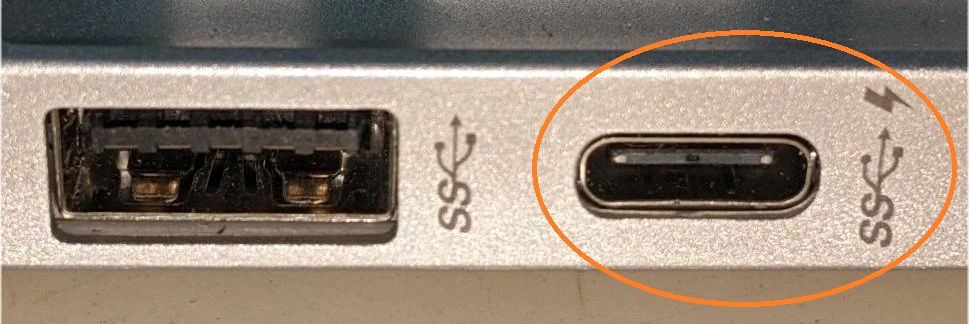 USB-C port with Power Delivery symbol