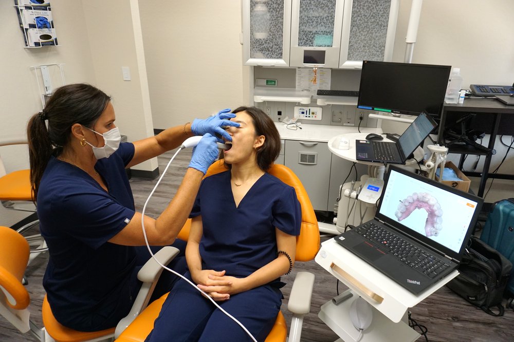 Maxillary scan alternate positioning — standing beside the patient