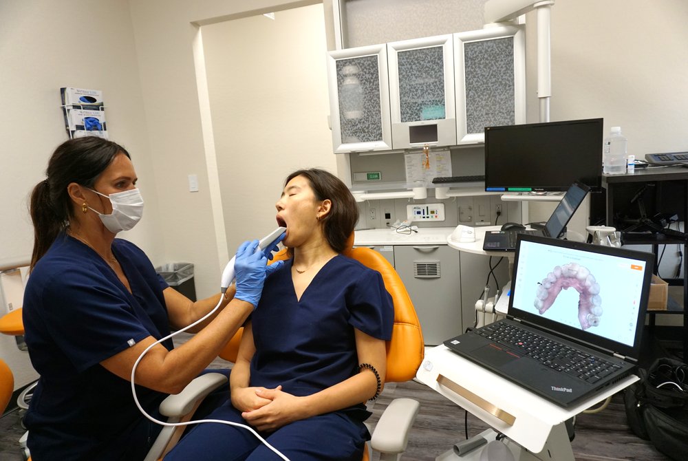 Mandibular scan alternate positioning, standing beside the patient